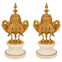 Pair of French 19th Century Louis XVI Style Ormolu and Marble Lidded Urns