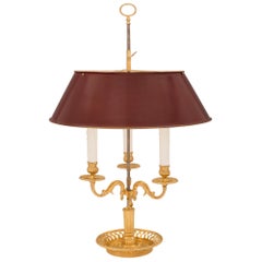 Paar französische Ormolu- und Tole-Bouilotte-Lampen im Louis-XVI.-Stil des 19. Jahrhunderts