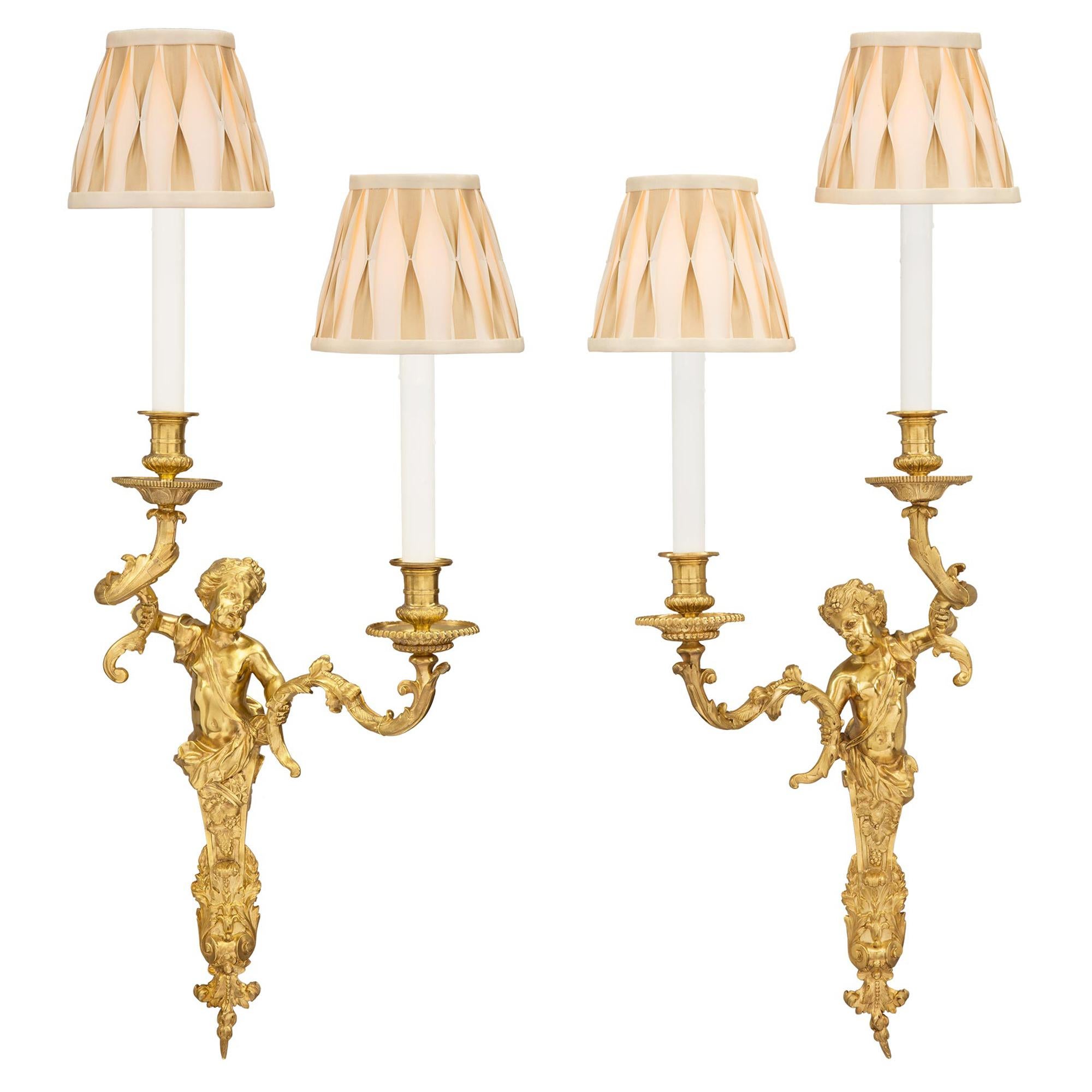 Pair of French 19th Century Louis XVI Style Ormolu Sconces, Attributed to Dasson For Sale