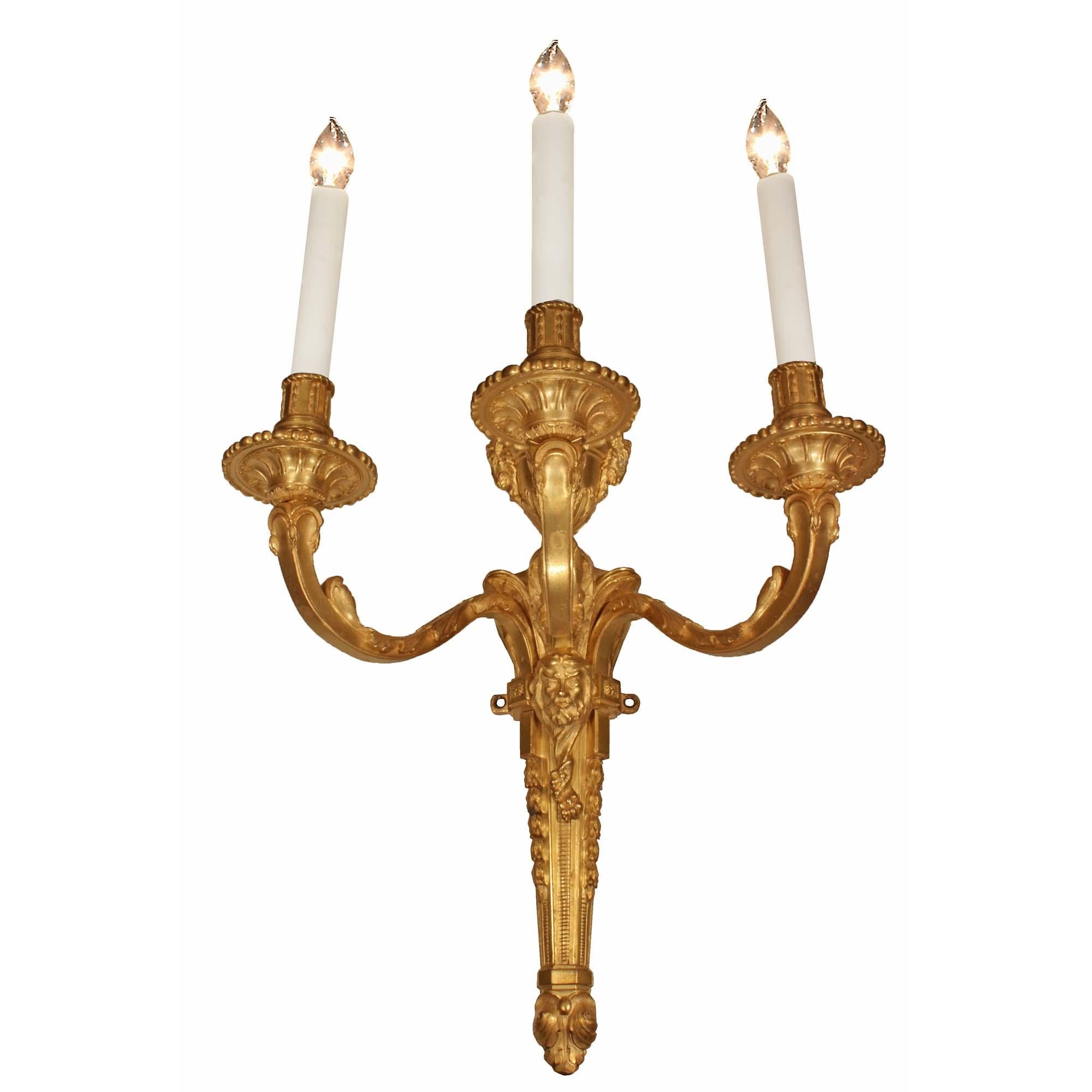 Pair of French 19th Century Louis XVI Style Ormolu Three-Arm Sconces In Good Condition In West Palm Beach, FL