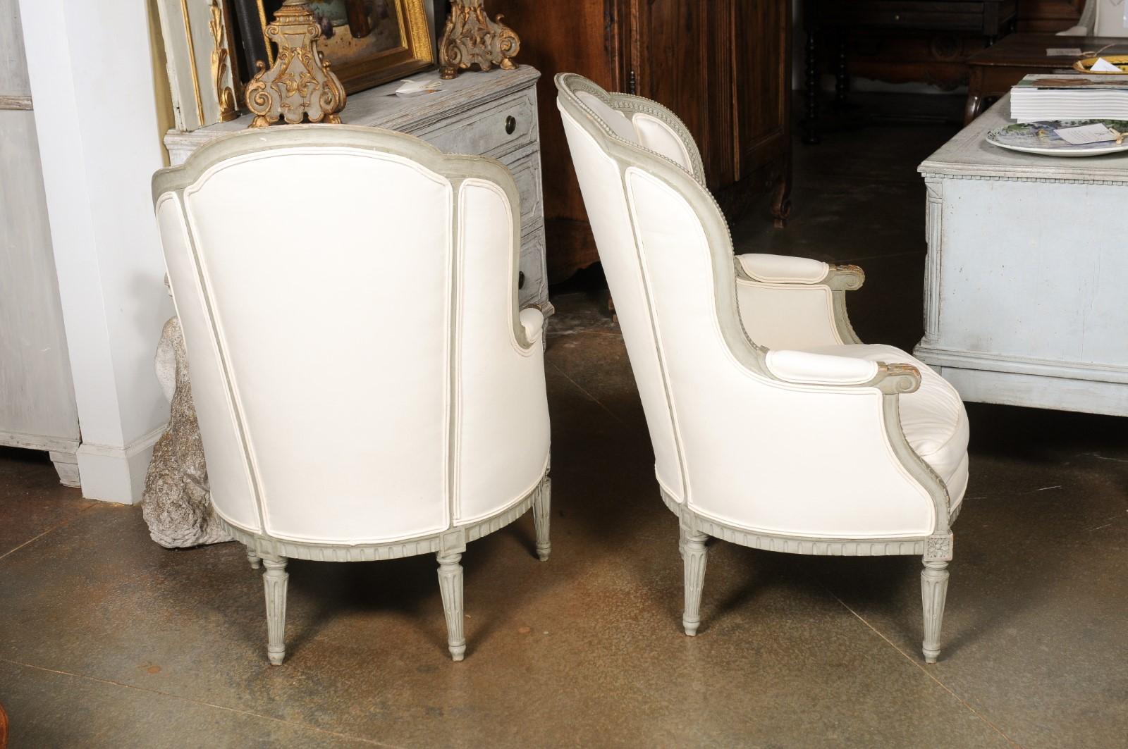 Pair of French 19th Century Louis XVI Style Painted Bergères with Upholstery For Sale 10