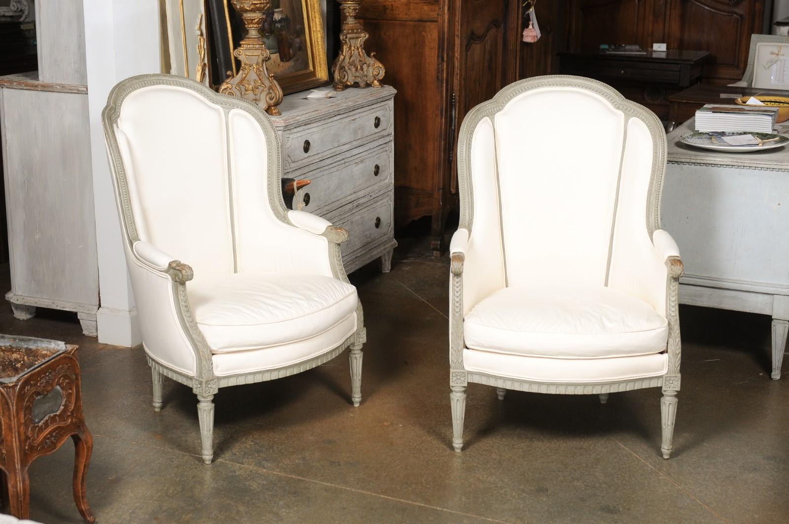 Pair of French 19th Century Louis XVI Style Painted Bergères with Upholstery For Sale 1