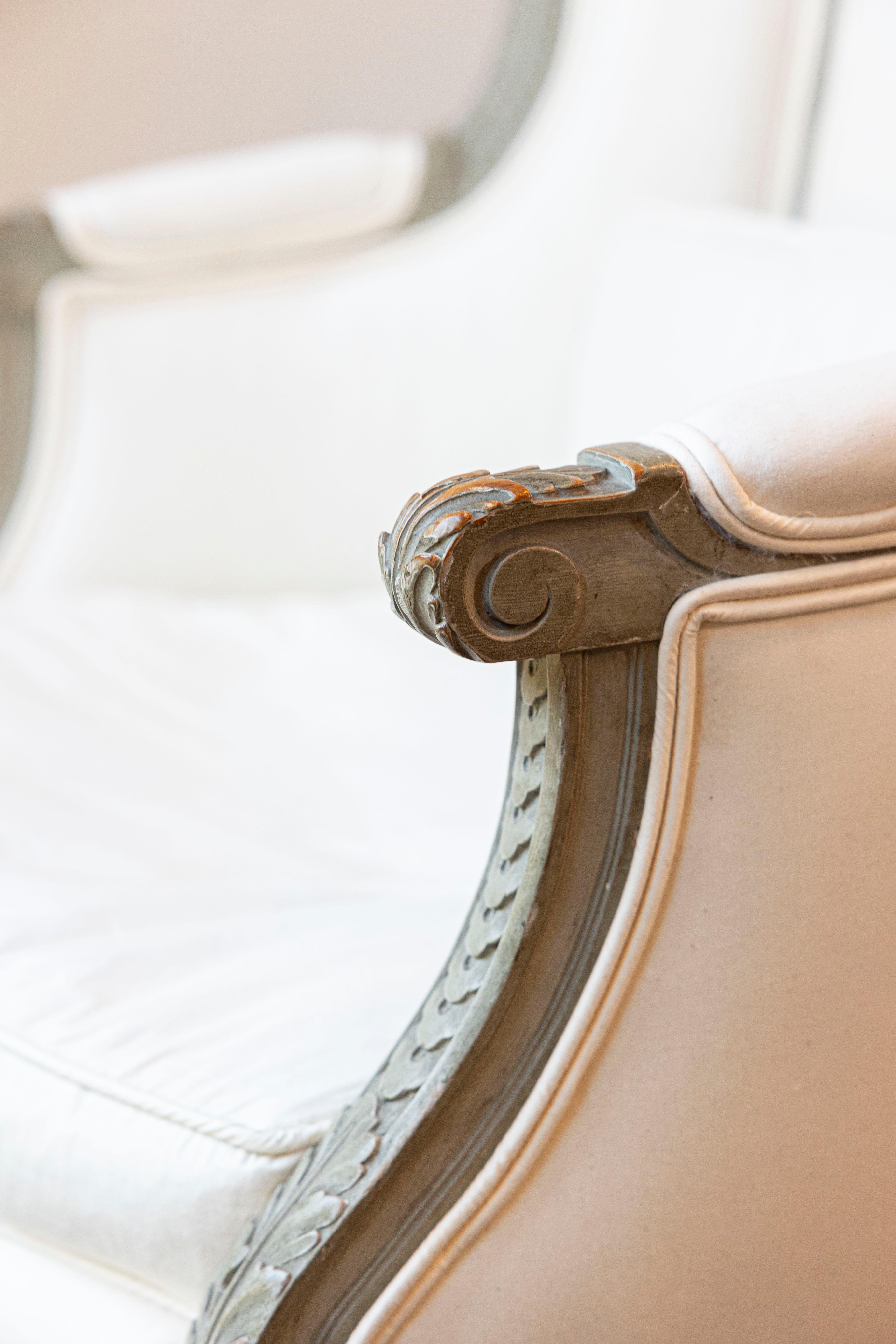 Pair of French 19th Century Louis XVI Style Painted Bergères with Upholstery For Sale 4