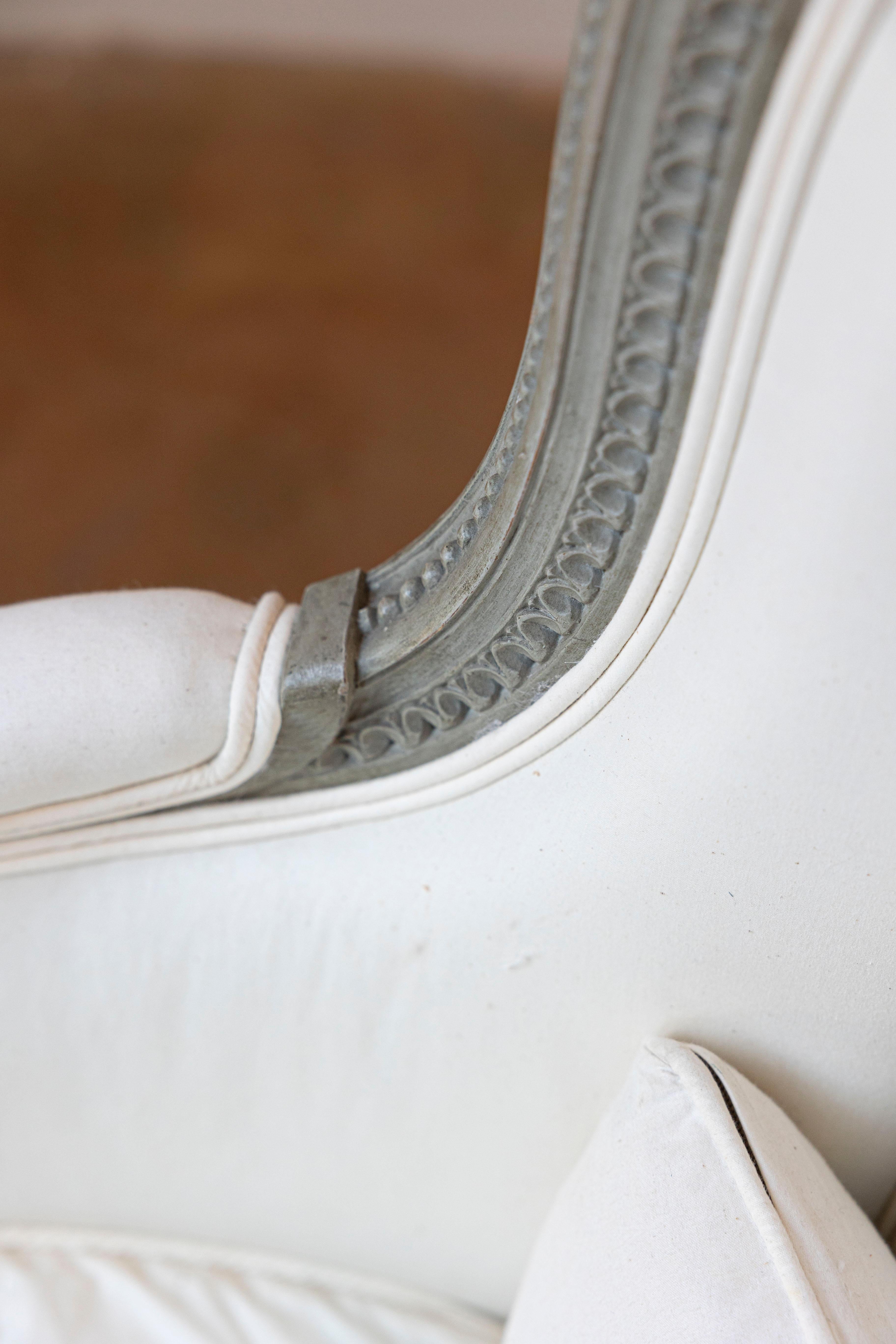 Pair of French 19th Century Louis XVI Style Painted Bergères with Upholstery For Sale 5