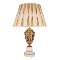 Coppia di lampade francesi del XIX secolo in stile Luigi XVI in bronzo patinato e ormeggio