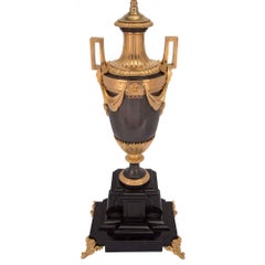 Pair of French 19th Century Louis XVI Style Patinated Bronze and Ormolu Lamps