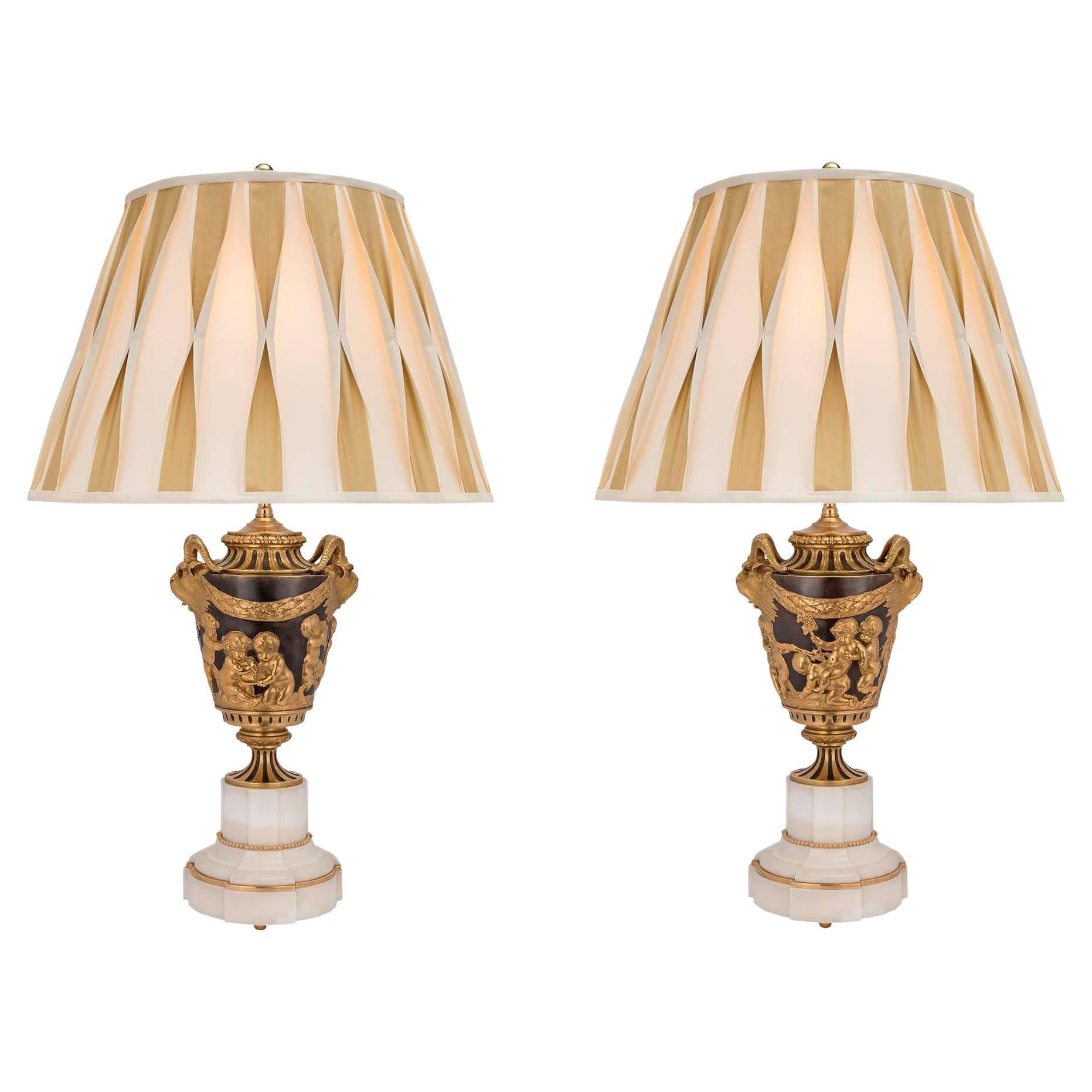 Pair of French 19th Century Louis XVI Style Patinated Bronze and Ormolu Lamps