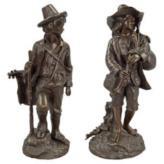 Used Pair of French 19th Century Louis XVI Style Patinated Bronze Statues