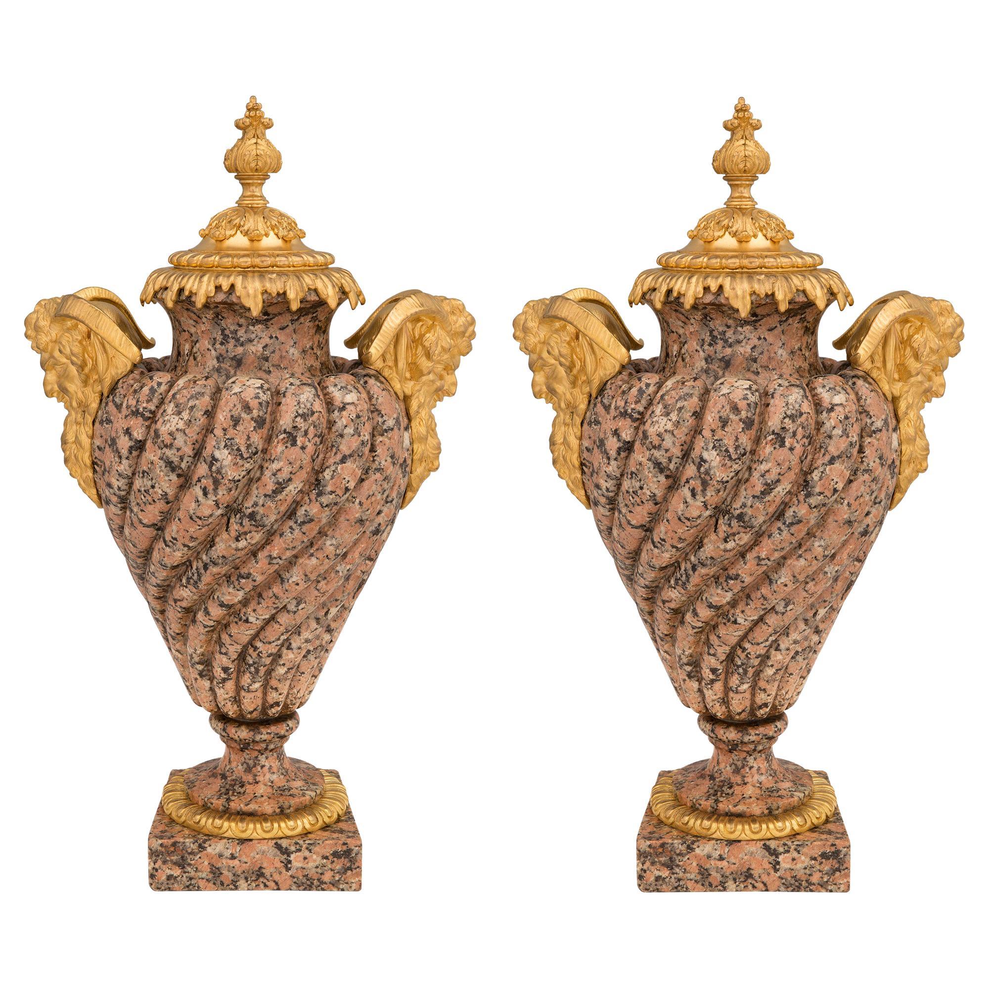 Pair of French 19th Century Louis XVI Style Pink Granite and Ormolu Urns For Sale