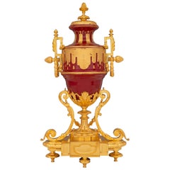 Pair of French 19th Century Louis XVI Style Porcelain and Ormolu Urns