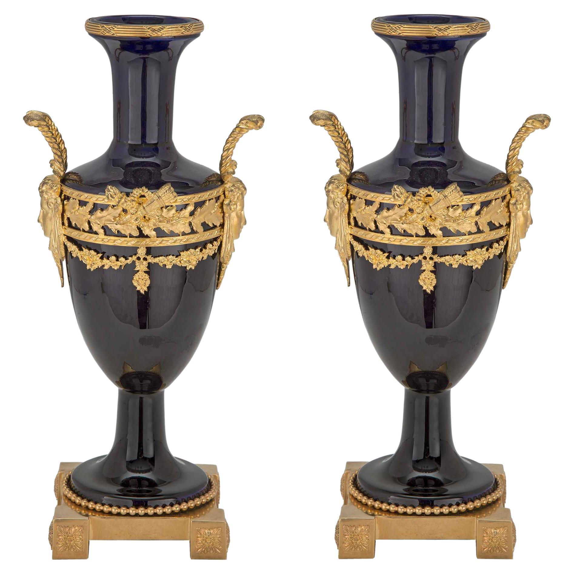 Pair of French 19th Century Louis XVI Style Porcelain and Ormolu Vases