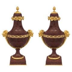 Pair of French 19th Century Louis XVI Style Porphyry and Ormolu Lidded Urns