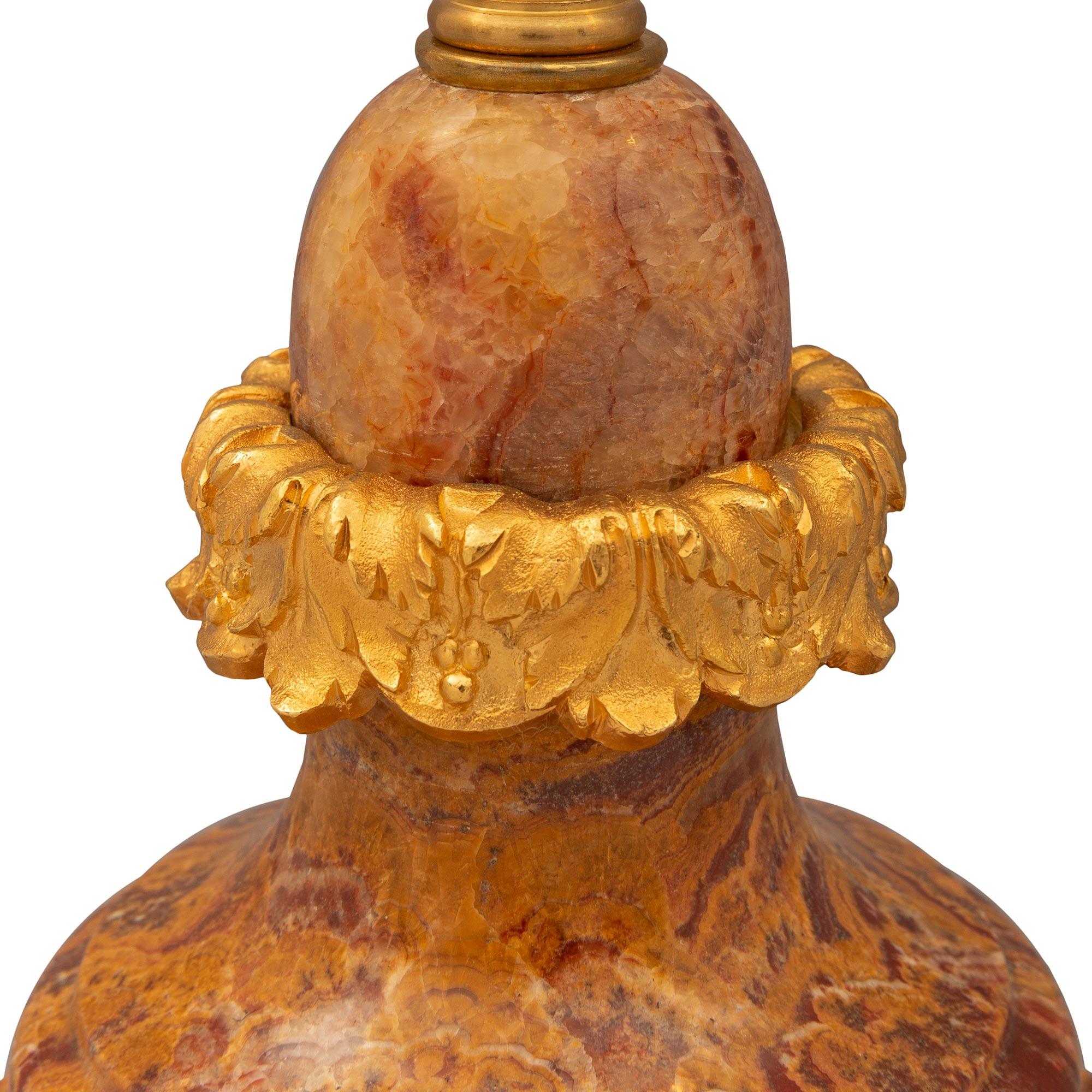 Pair of French 19th Century Louis XVI Style Red Vulcano Onyx and Ormolu Lamps For Sale 2