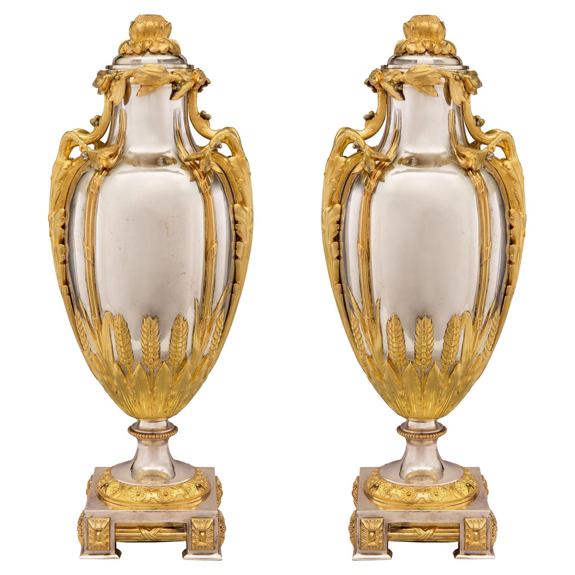 Pair of French 19th Century Louis XVI Style Silvered Bronze and Ormolu Urns