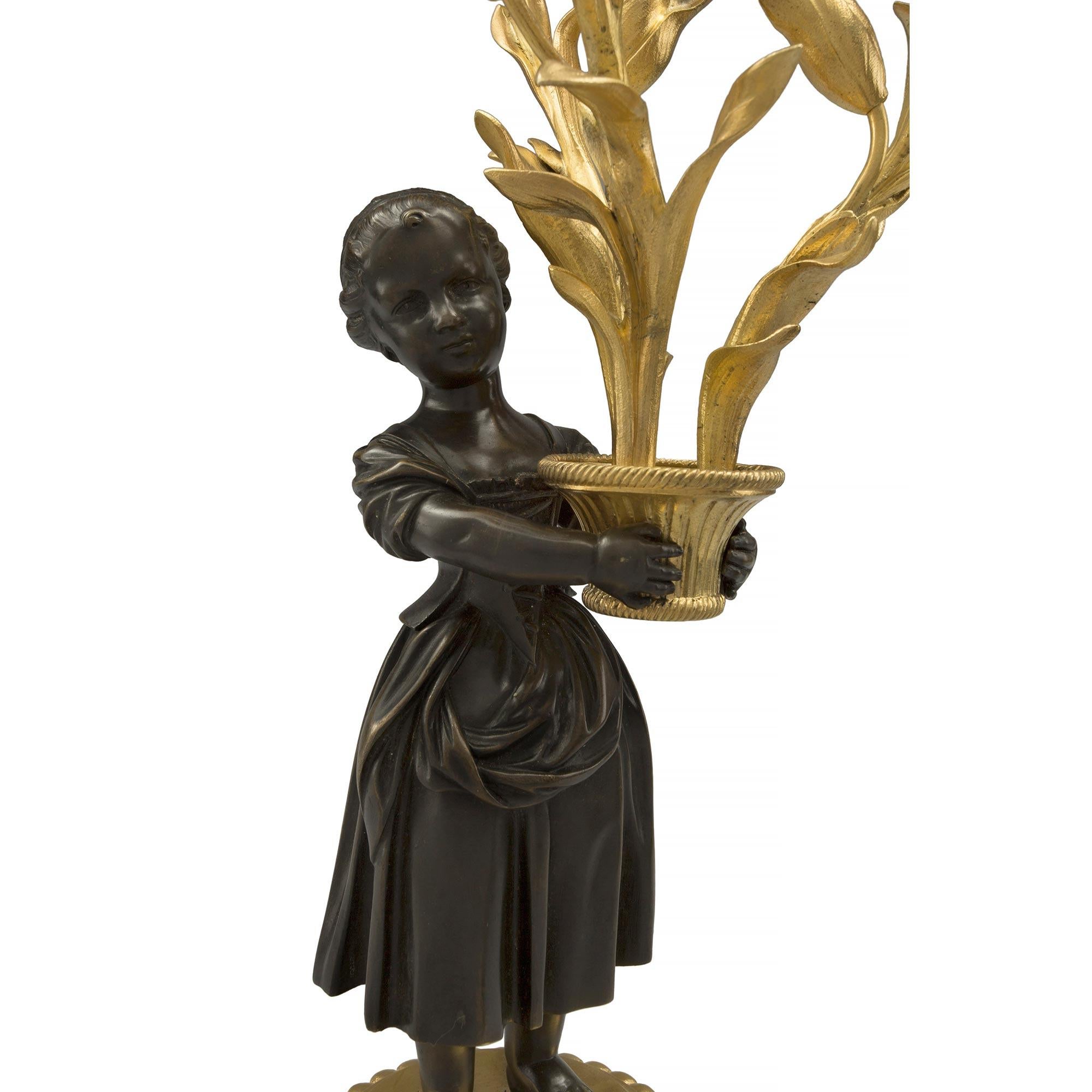 Bronze Paire de candélabres à trois bras de style Louis XVI du XIXe siècle français en vente