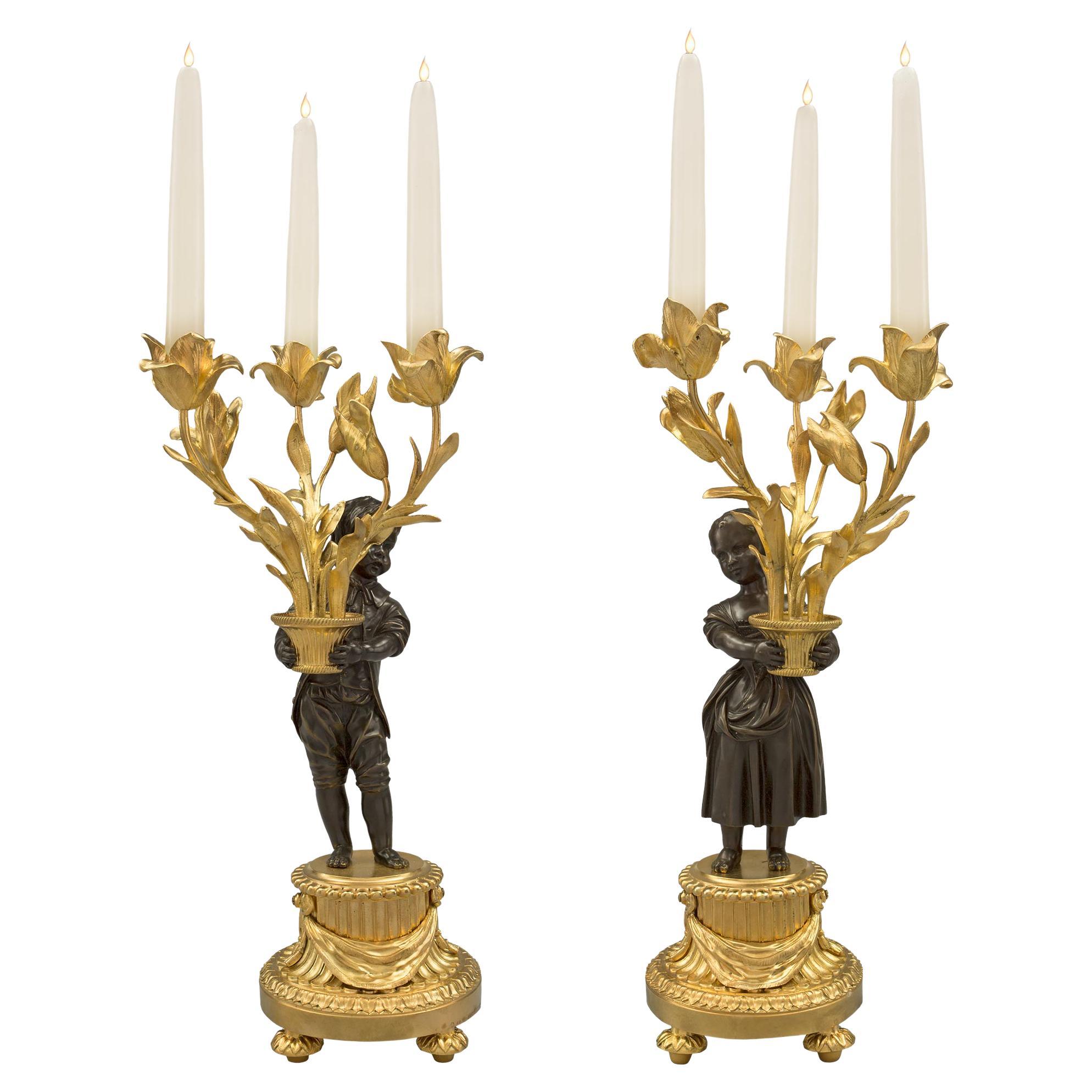Paire de candélabres à trois bras de style Louis XVI du XIXe siècle français