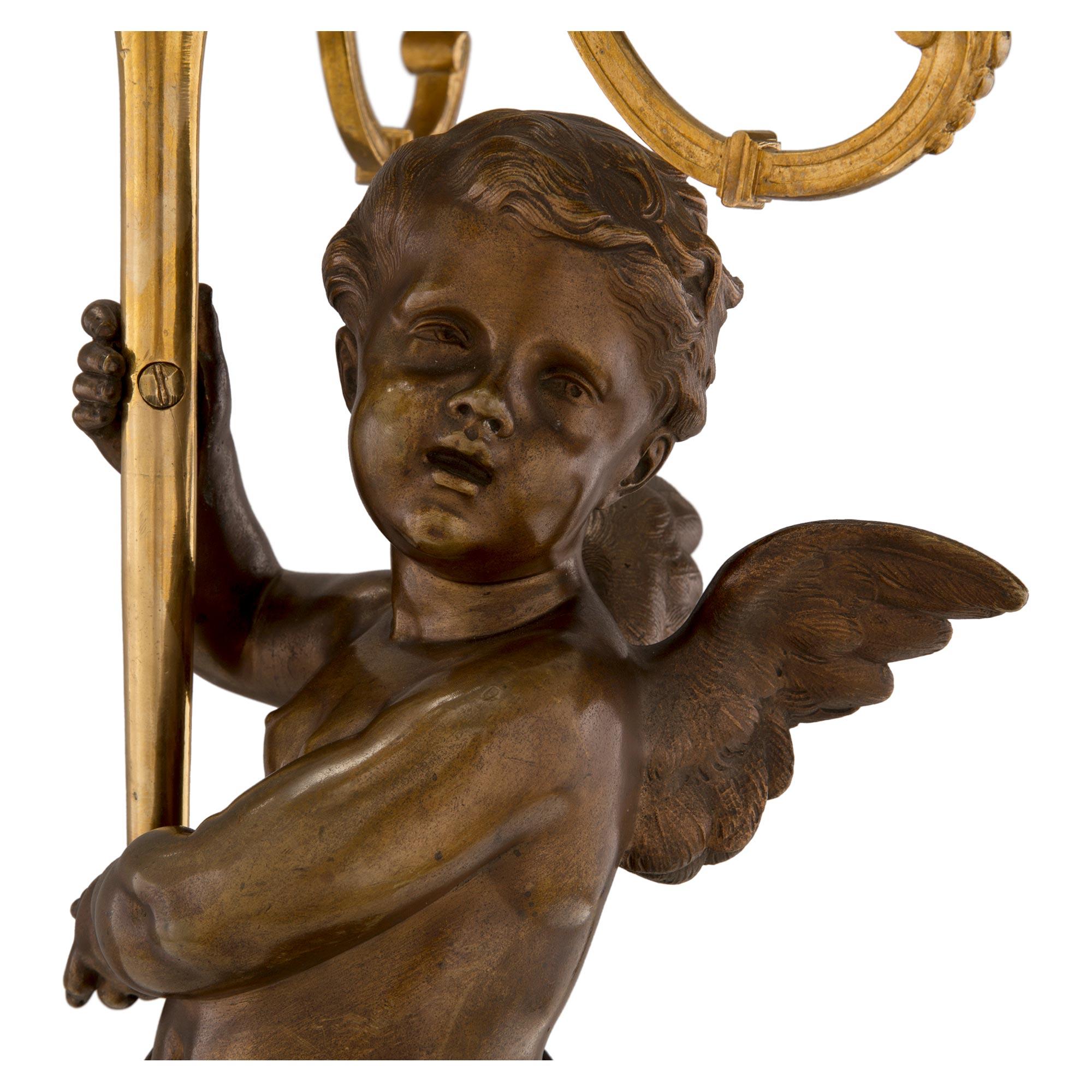 Bronze Pair of French 19th Century Louis XVI Style Winged Cherub Candelabras For Sale