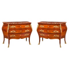 Paire de Commodes Françaises du 19ème siècle en acajou, doré et marbre rouge