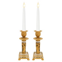 pair of French 19th century Neo-Classical st. Ormolu and Crystal candlesticks
