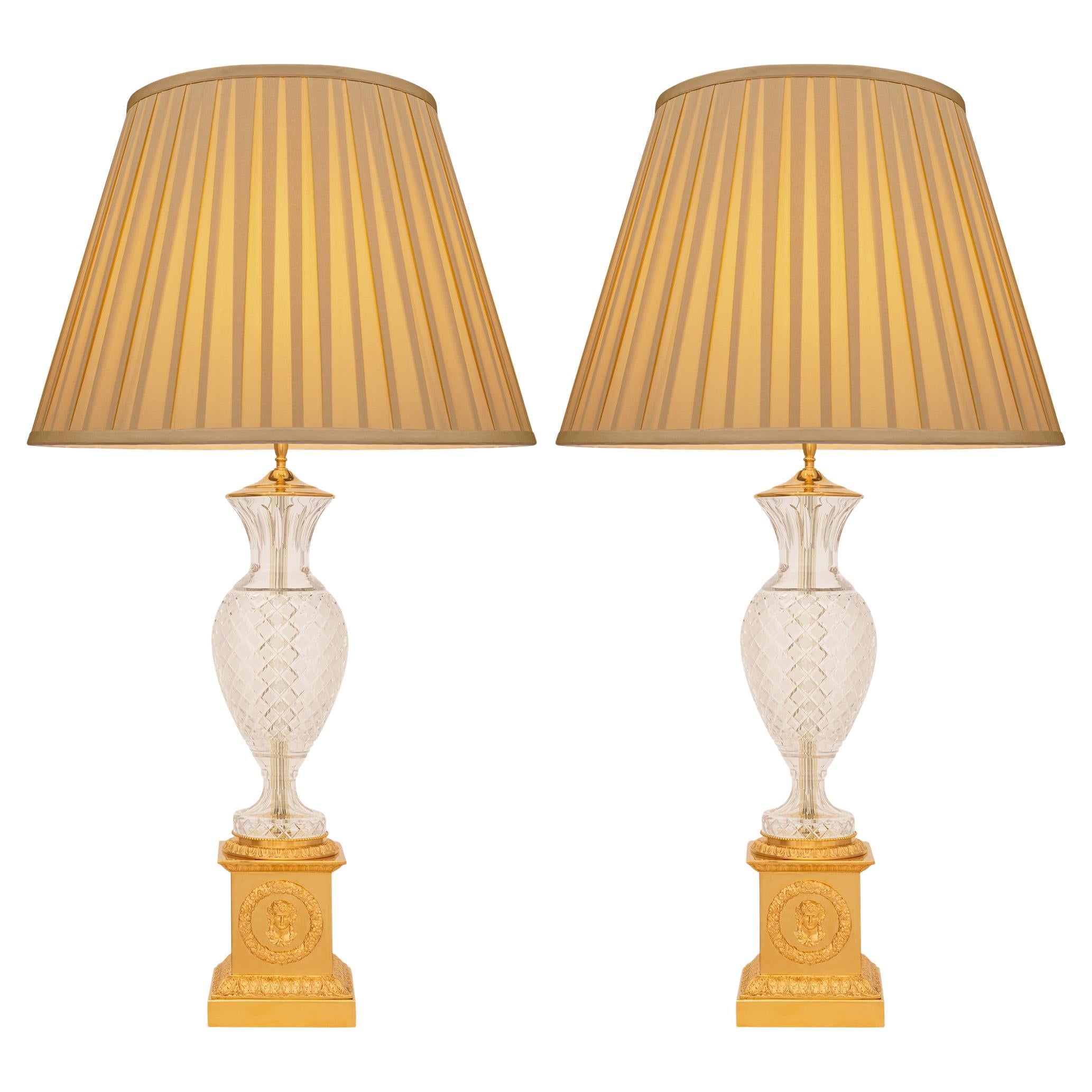 pair of French 19th century Neo-Classical st. Ormolu and Crystal lamps