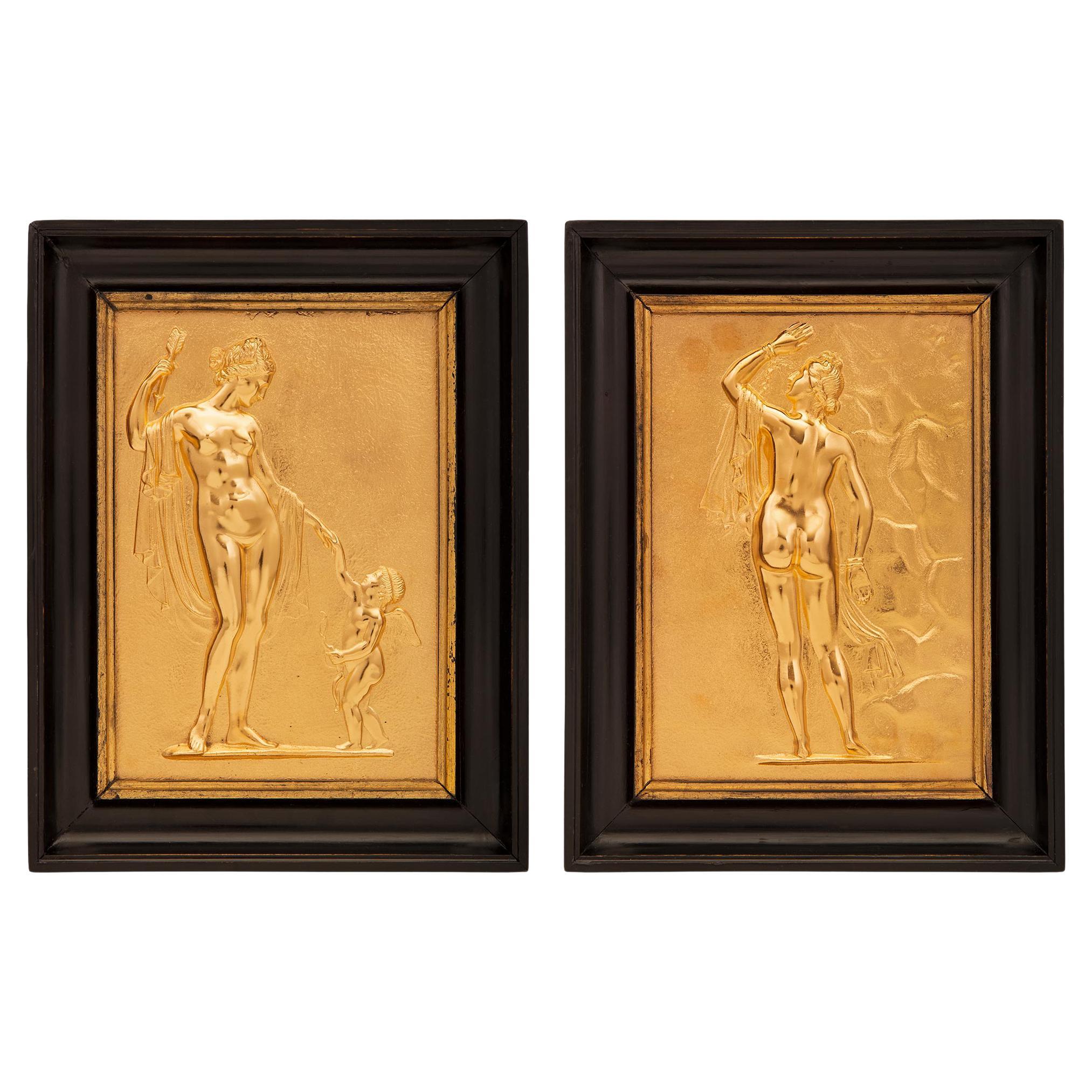 Pair of French 19th Century Neo-Classical St. Ormolu and Ebony Wall Plaques For Sale