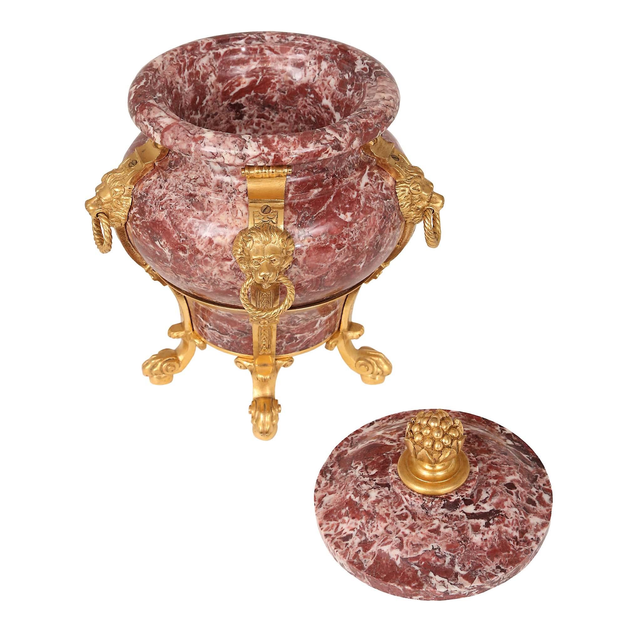 Pair Of French 19th Century Neo-Classical St. Rose Marble And Ormolu Urns In Good Condition For Sale In West Palm Beach, FL
