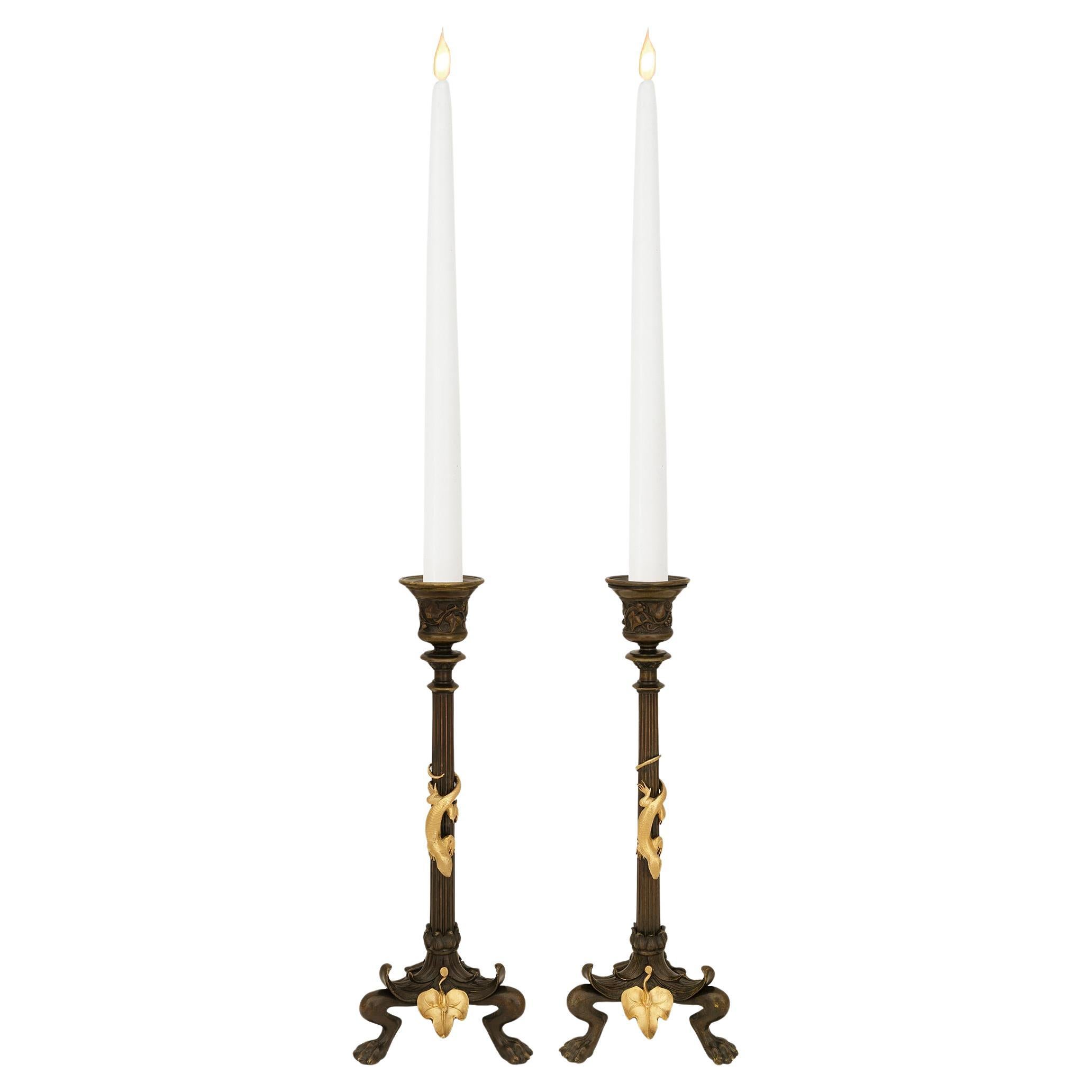 pair of French 19th century Neo-Greek st. Bronze and Ormolu candlesticks