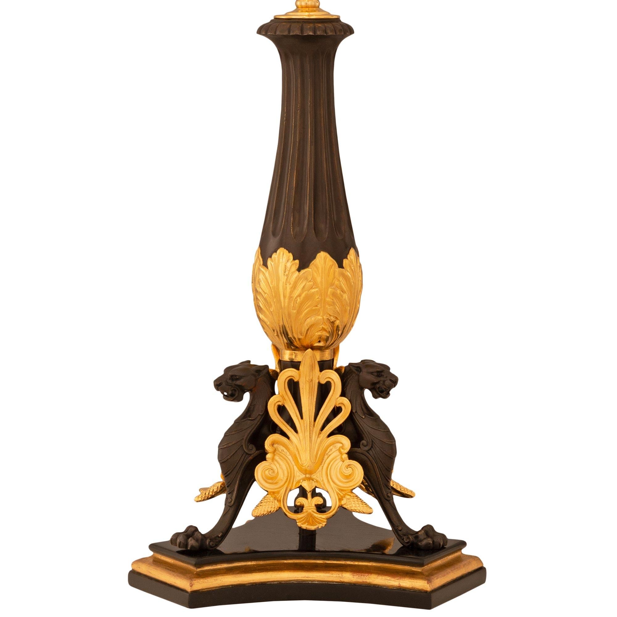 Greek Revival pair of French 19th century Neo-Greek st. Giltwood, Bronze and Ormolu lamps For Sale