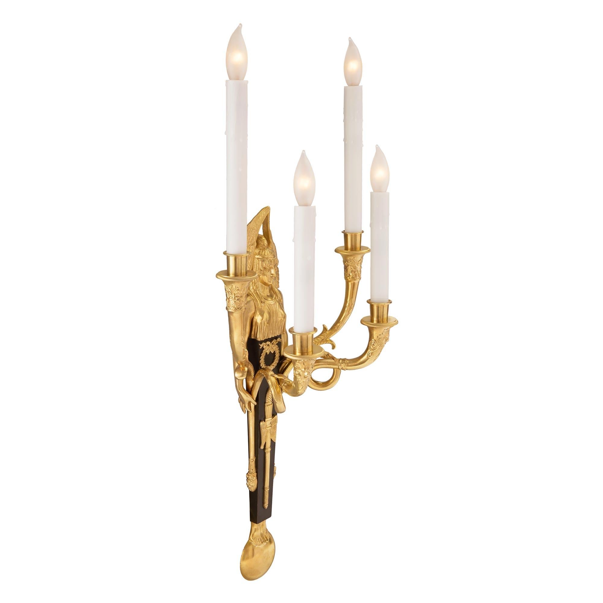 Patinated Pair of French 19th Century Neoclassical St. Bronze and Ormolu Sconces For Sale