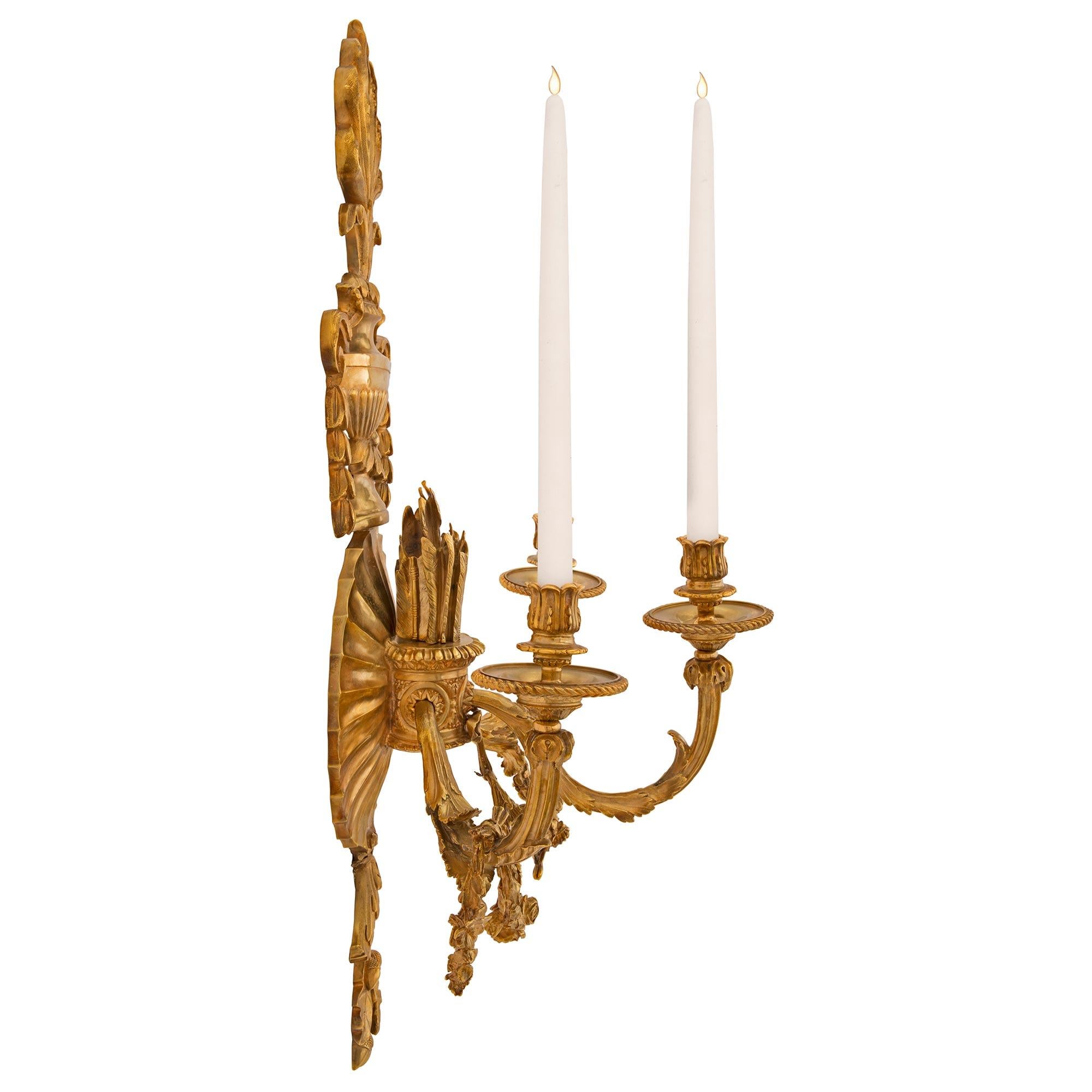 Pair of French 19th Century Neoclassical St. Ormolu Three-Arm Sconces In Good Condition For Sale In West Palm Beach, FL