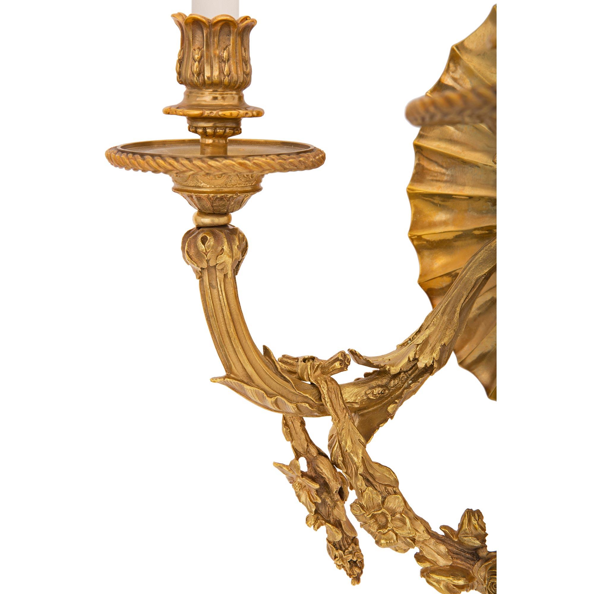 Pair of French 19th Century Neoclassical St. Ormolu Three-Arm Sconces For Sale 3