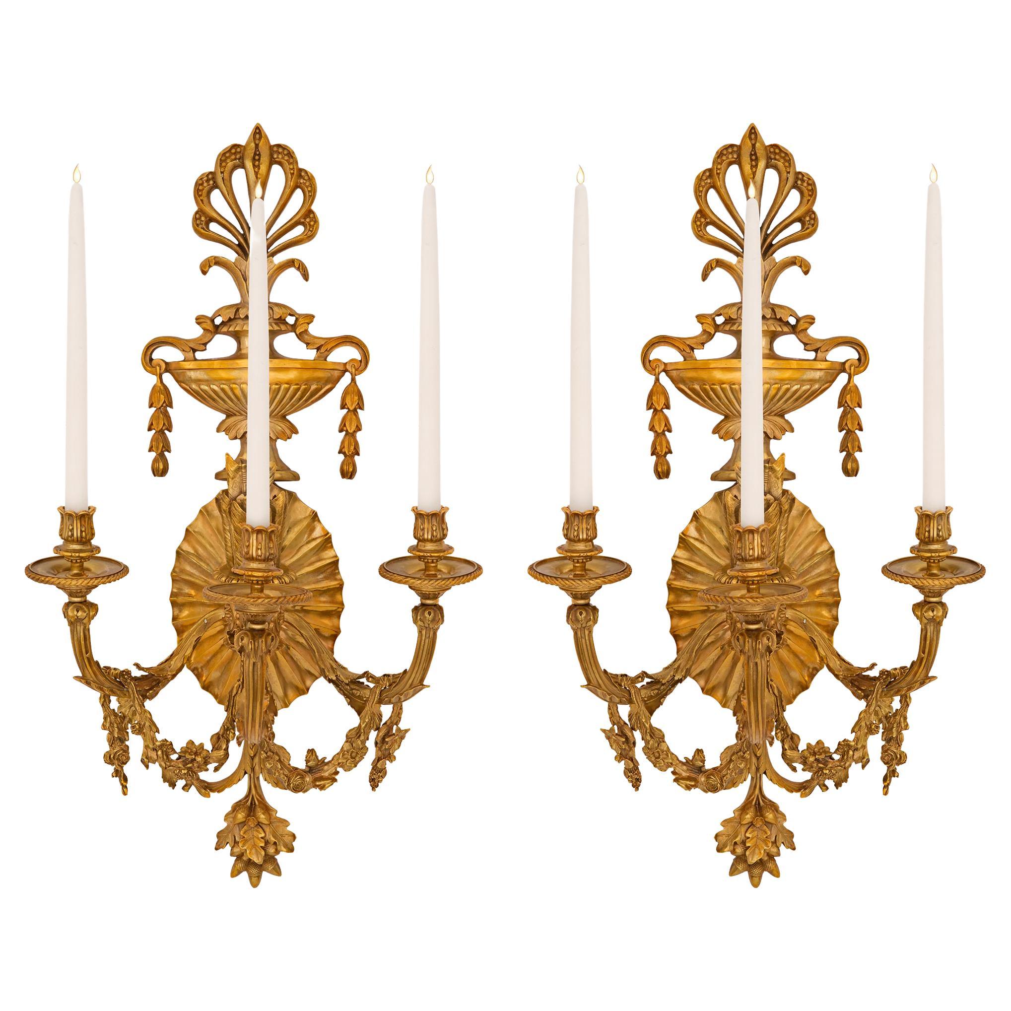 Pair of French 19th Century Neoclassical St. Ormolu Three-Arm Sconces