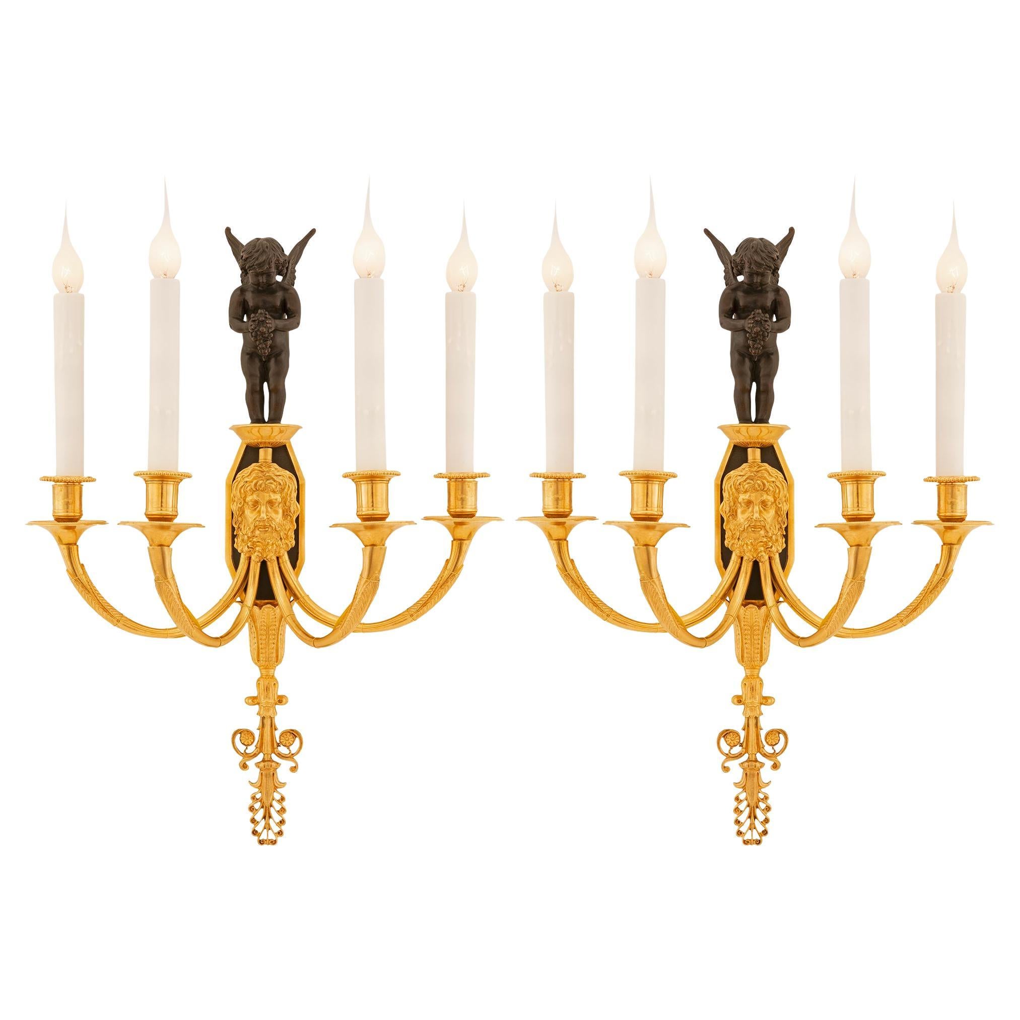 Pair of French 19th Century Neoclassical St. Patinated Bronze and Ormolu Sconces