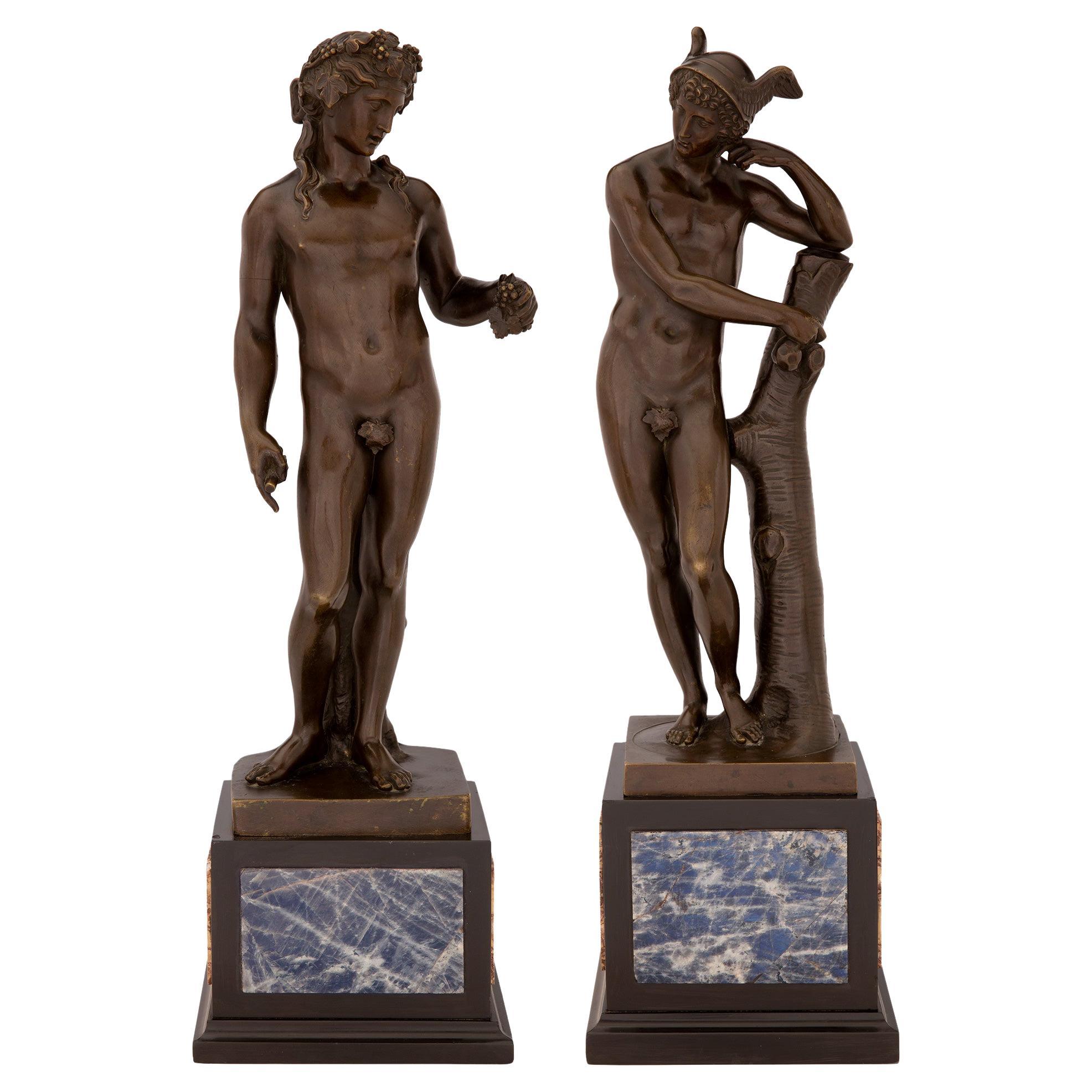 Pair of French 19th Century Neoclassical Style Patinated Bronze Statues For Sale