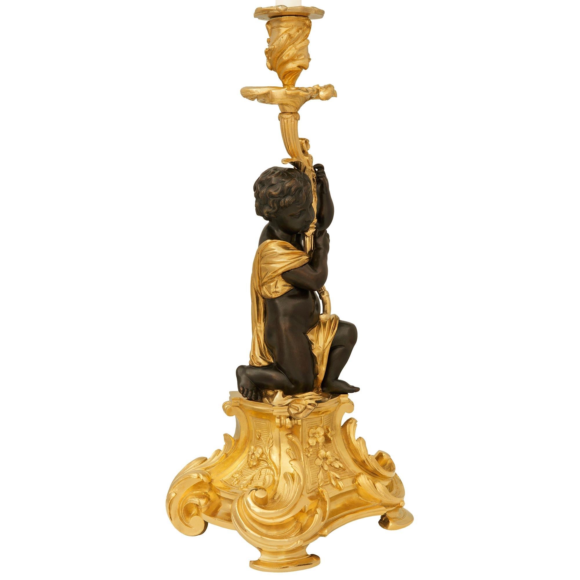 pair of French 19th century Ormolu and Bronze candlesticks, by Picard In Good Condition For Sale In West Palm Beach, FL