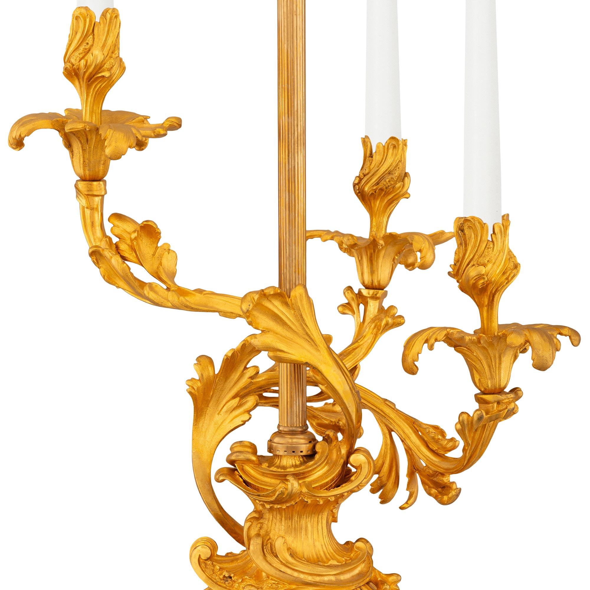 pair of French 19th century Louis XV st. Ormolu and marble candelabra lamps In Good Condition For Sale In West Palm Beach, FL