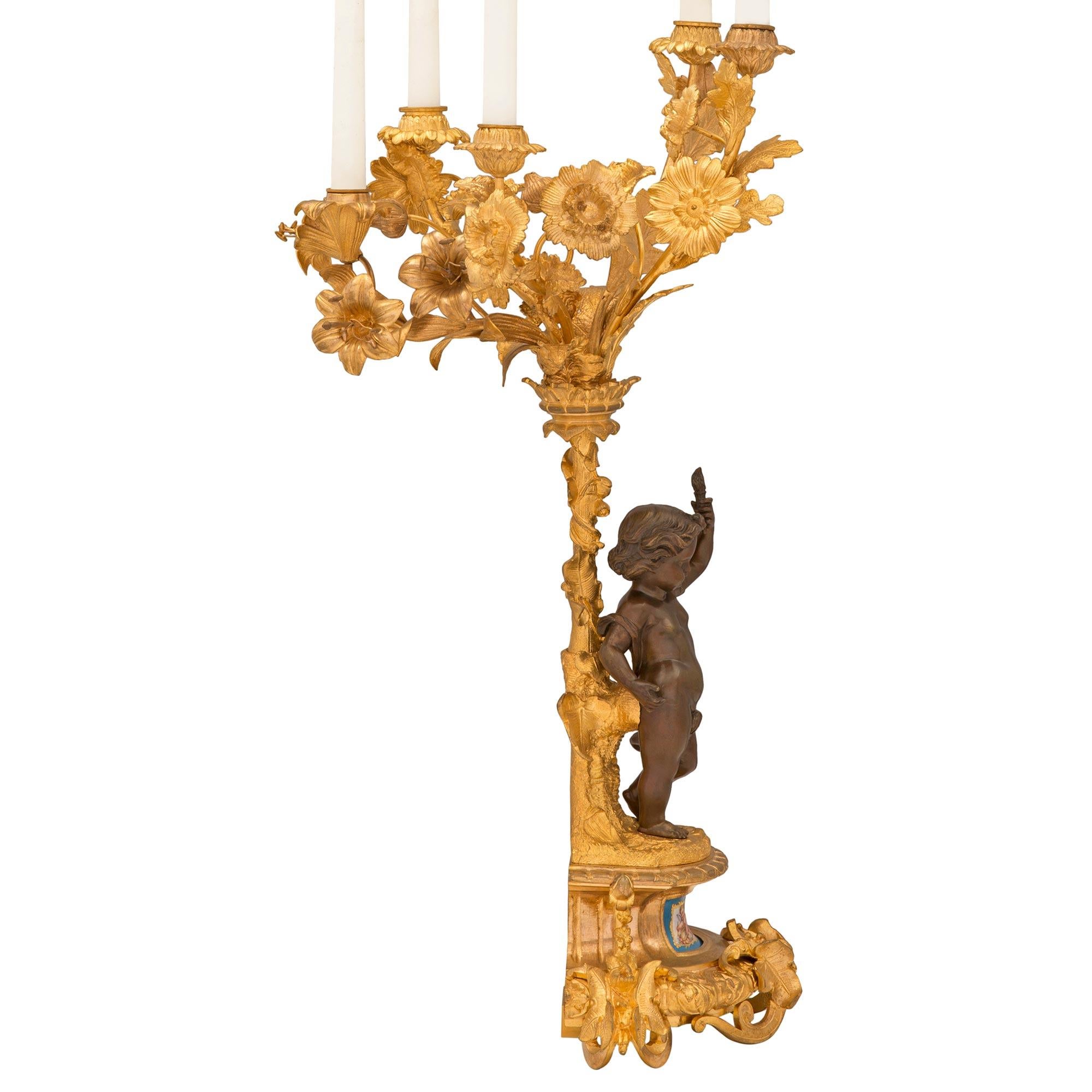 Louis XVI Pair of French 19th Century Ormolu and Patinated Bronze Candelabras For Sale