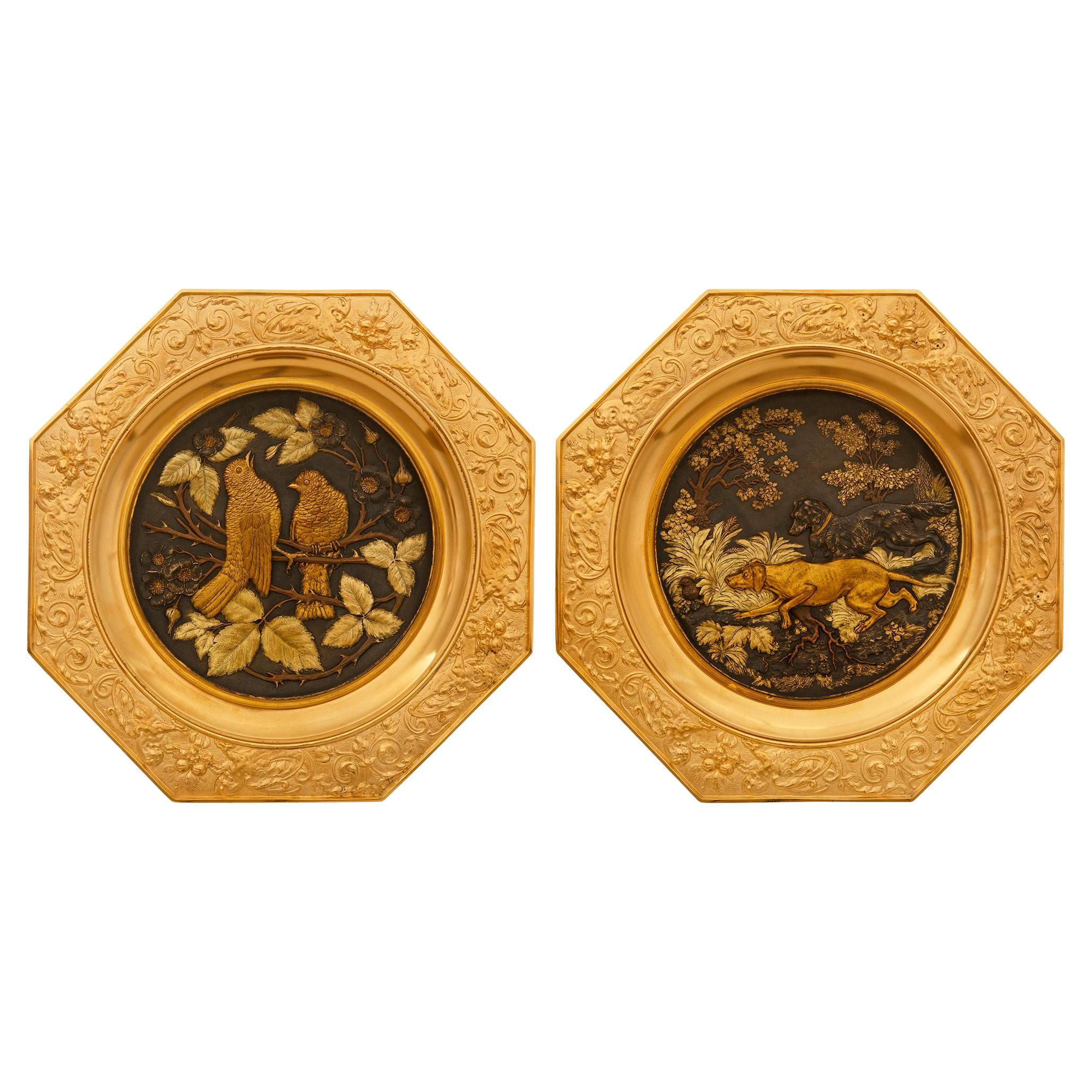 pair of French 19th century Ormolu and patinated Bronze wall decor/plates