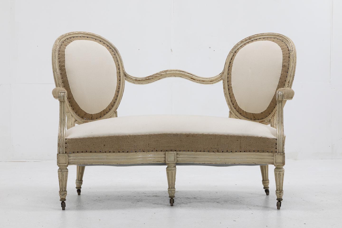 Unusual, French late 19th century sofas with serpentine front and original paint.

Measures: Seat height: 41 cm

These items are our new deconstructed look, using high quality heavyweight calico and also a heavyweight natural burlap (hessian