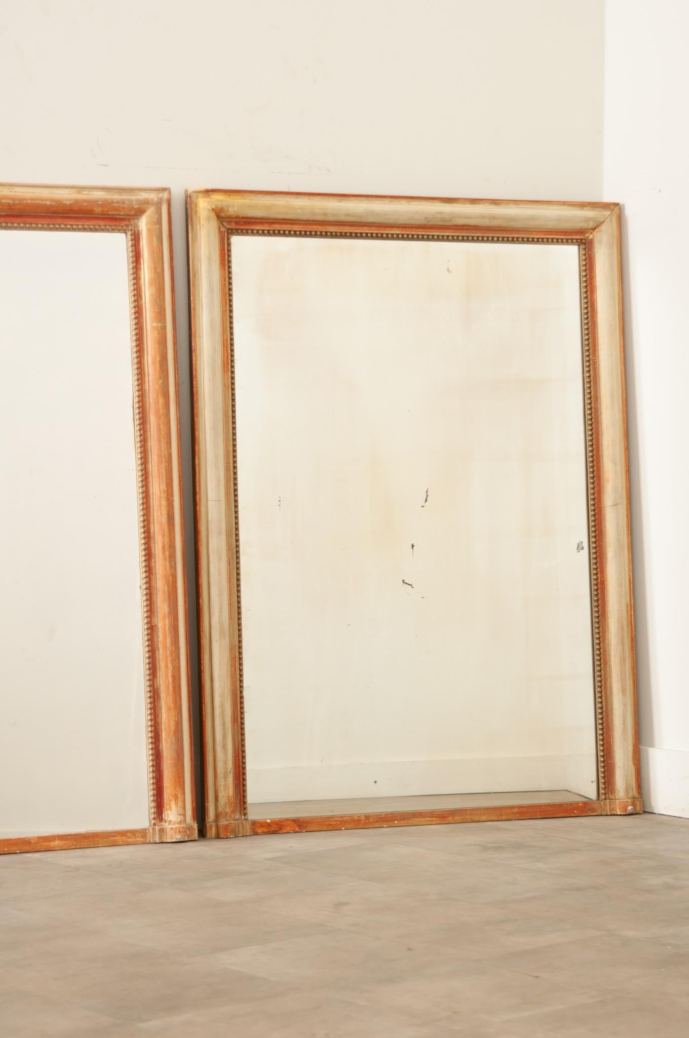 Hand-Carved Pair of French 19th Century Parcel Gilt and Painted Mirrors For Sale