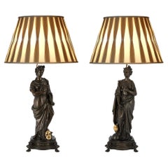Paar französische Lampen aus patinierter Bronze und Goldbronze aus dem 19. Jahrhundert