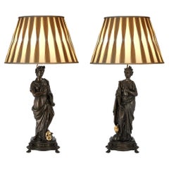 Paire de lampes françaises du 19ème siècle en bronze patiné et bronze doré