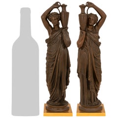 Coppia di statue firmate in bronzo patinato del XIX secolo francese