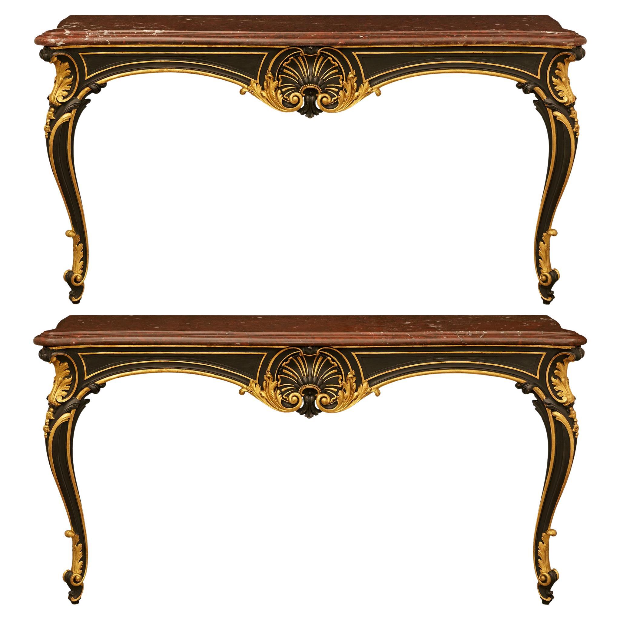 pair of French 19th century patinated Wood, Marble and Giltwood consoles