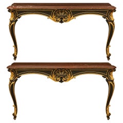 Antique pair of French 19th century patinated Wood, Marble and Giltwood consoles