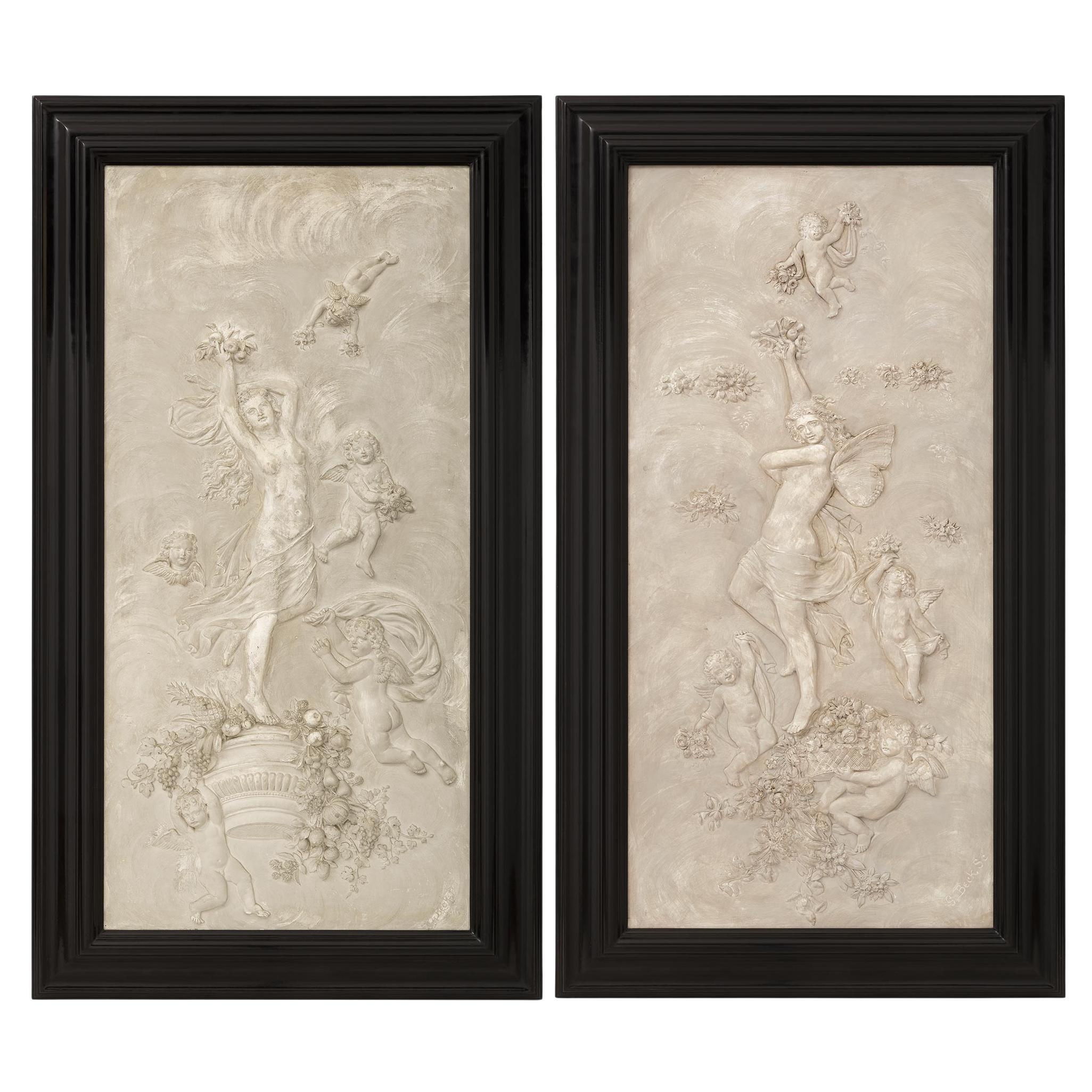 pair of French 19th century Plaster and Ebony plaques, signed G. Beck For Sale