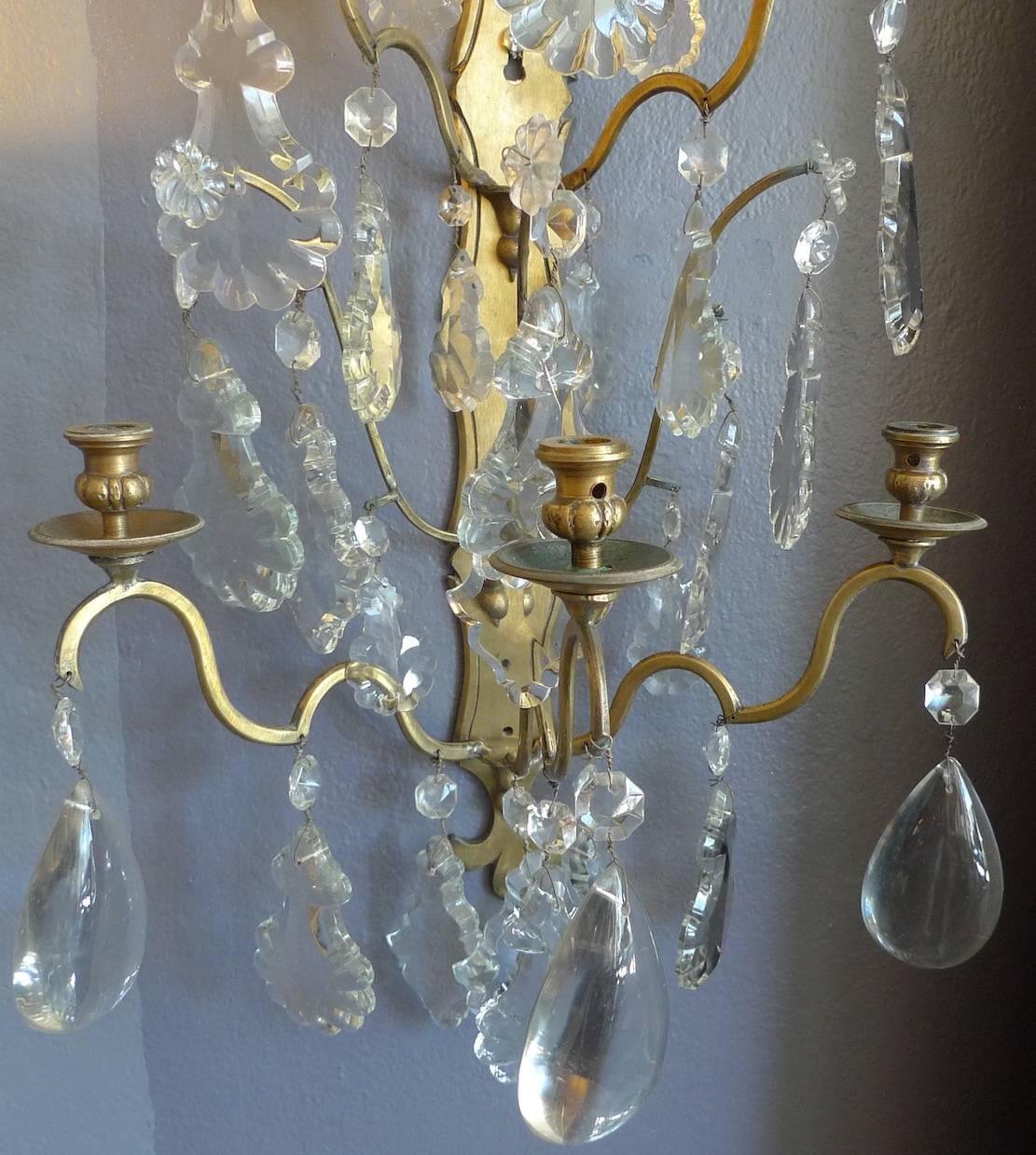 Pair of French 19th Century Polished Bronze and Crystal Sconces 1