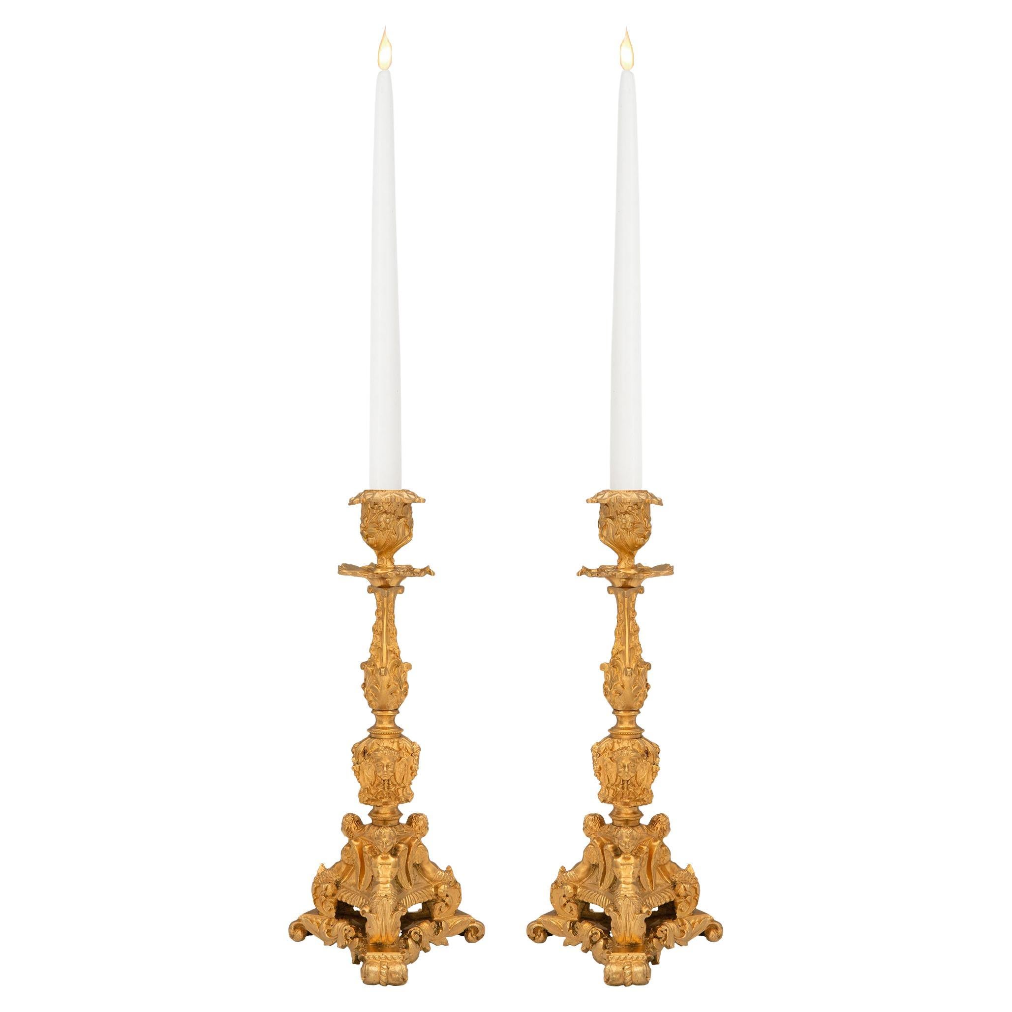 Pair of French 19th Century Regence Style Ormolu Candlesticks