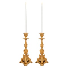 Antique Pair of French 19th Century Regence Style Ormolu Candlesticks