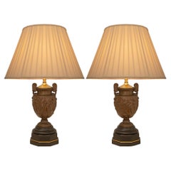 Paire de lampes de style Renaissance du 19ème siècle en bronze et marbre